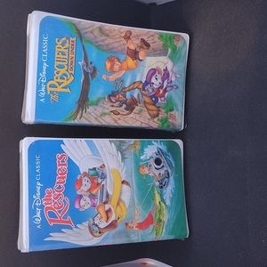 Never opened Disney The Rescuers and The Rescuers down under vhs